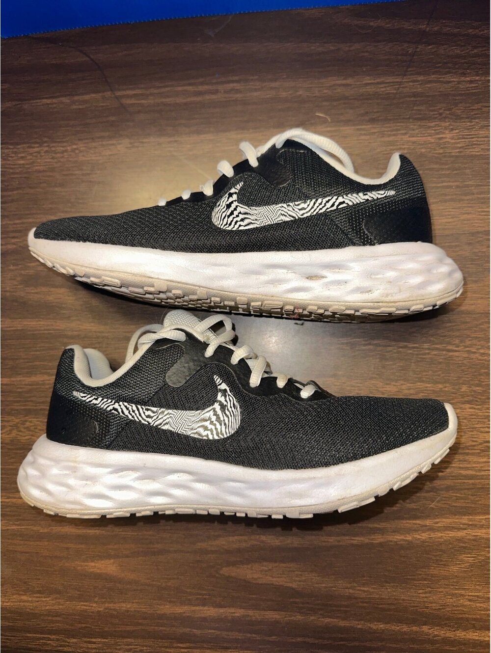 Nike black and white running shoes size 7